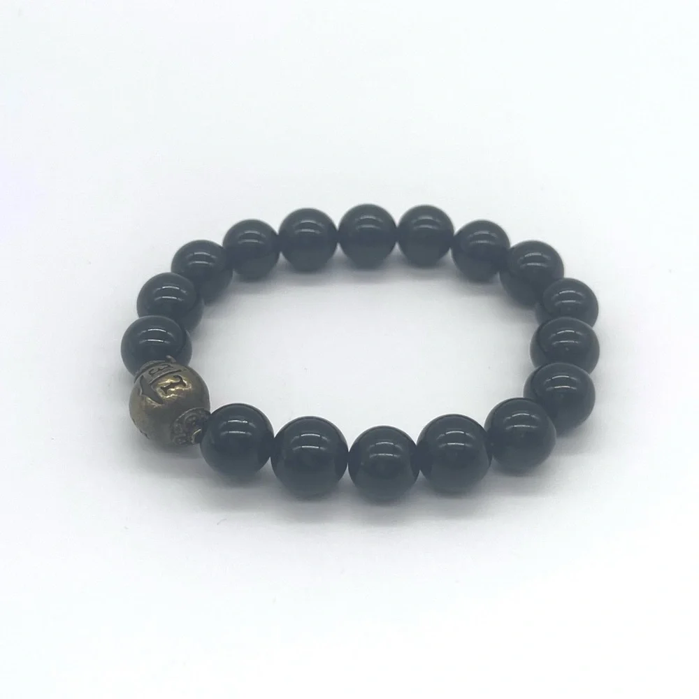 Onyx Stretch Bracelet w/ gold tone zen charm
